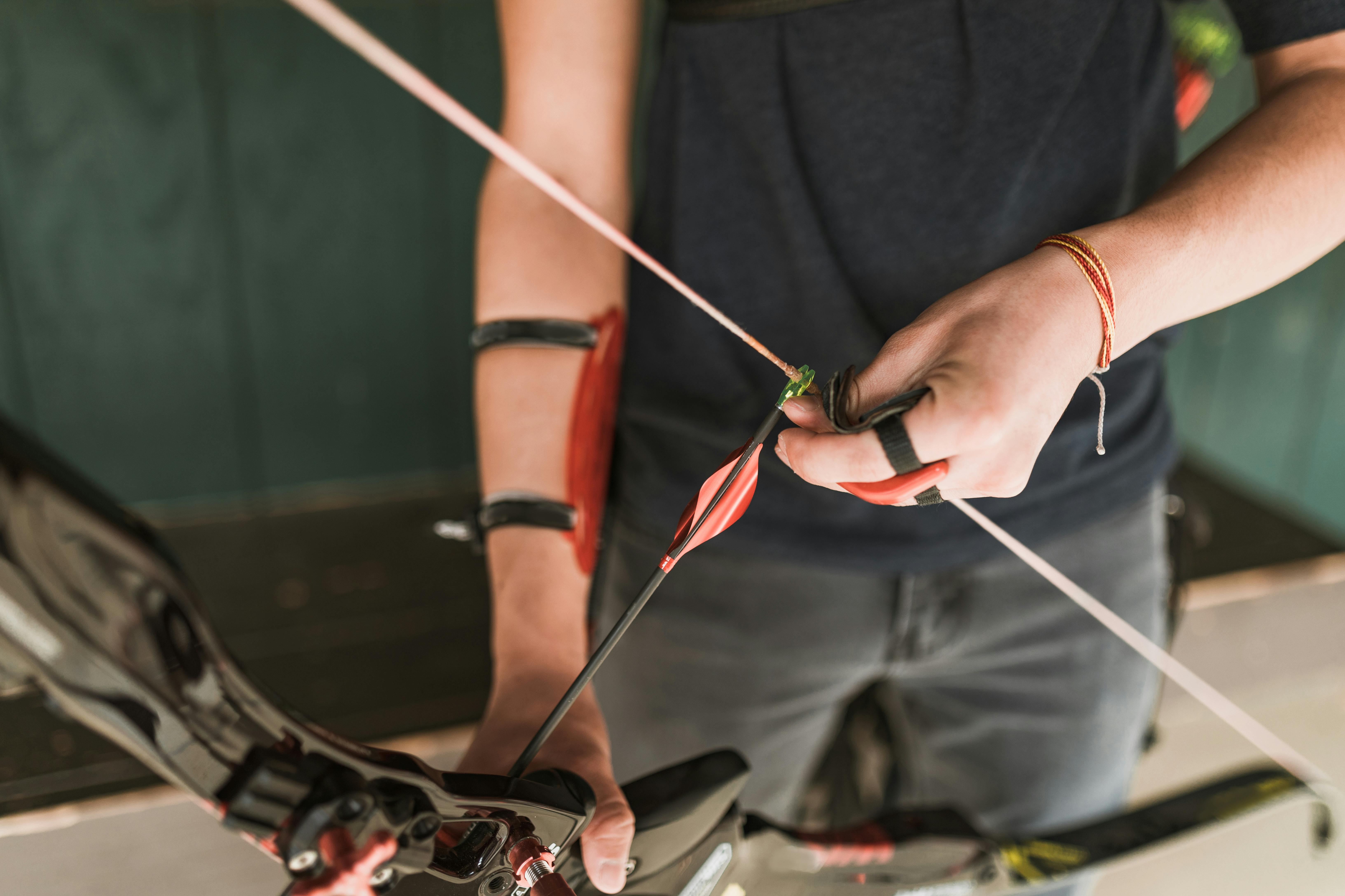 A close up photo of a hunter's bow while practicing archery  in the backyard.