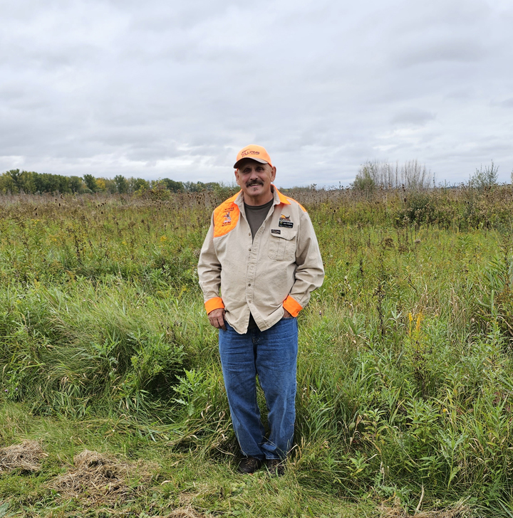Ken Dalton standing on the edge of a pheasant release site